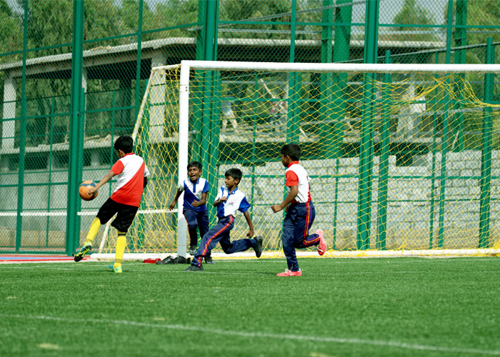 Outdoor sports activity on the school grounds at NewAge World School